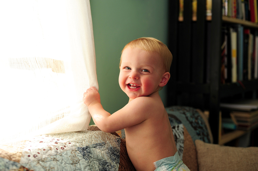 baby looking out window