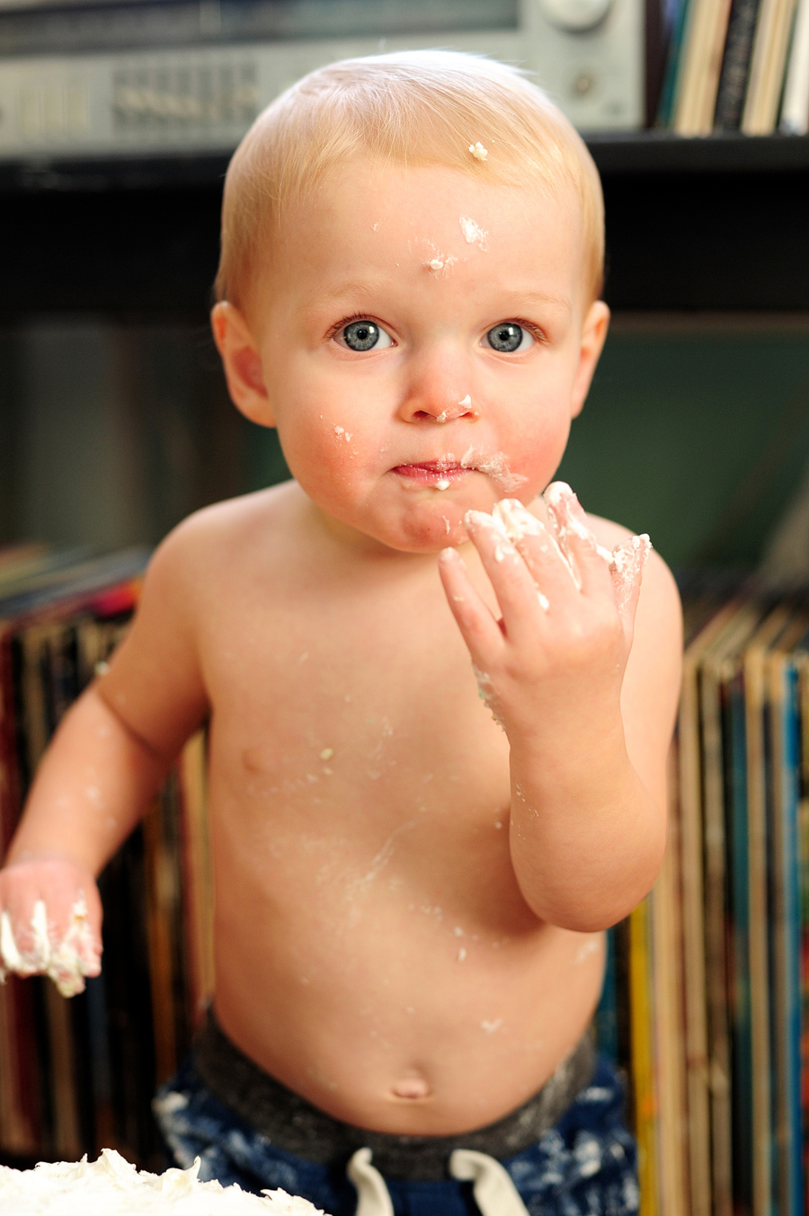 baby covered in frosting