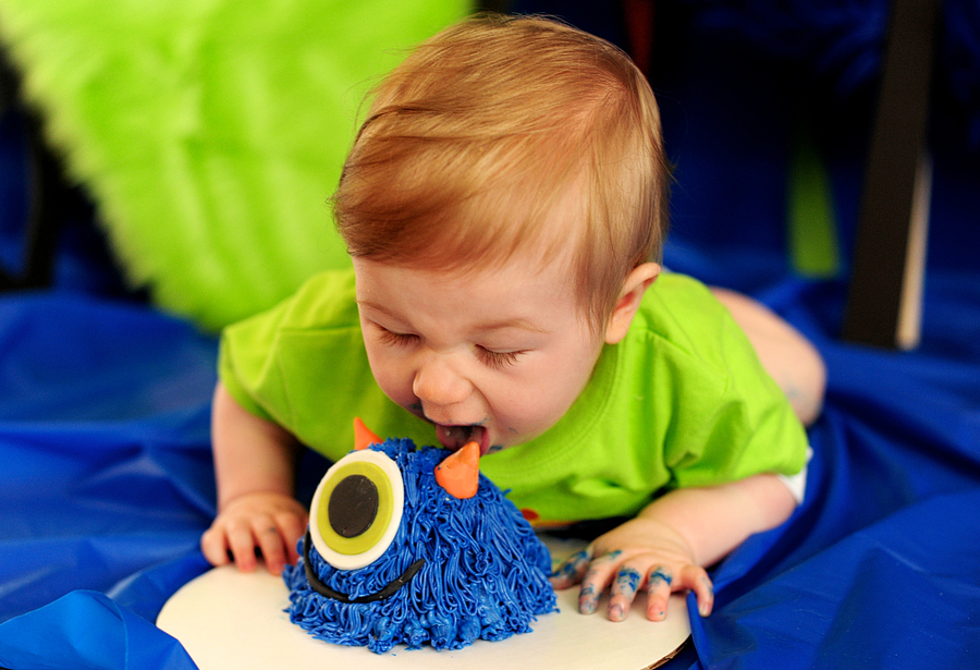 baby eating cake