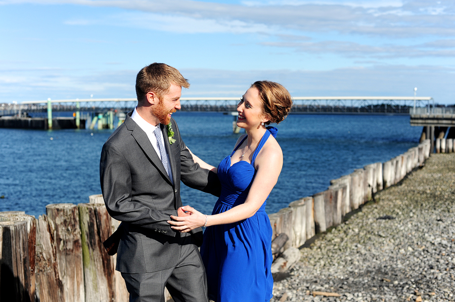 groom laughing with his sister