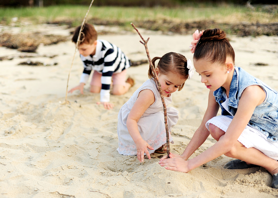 kids building sandcastles