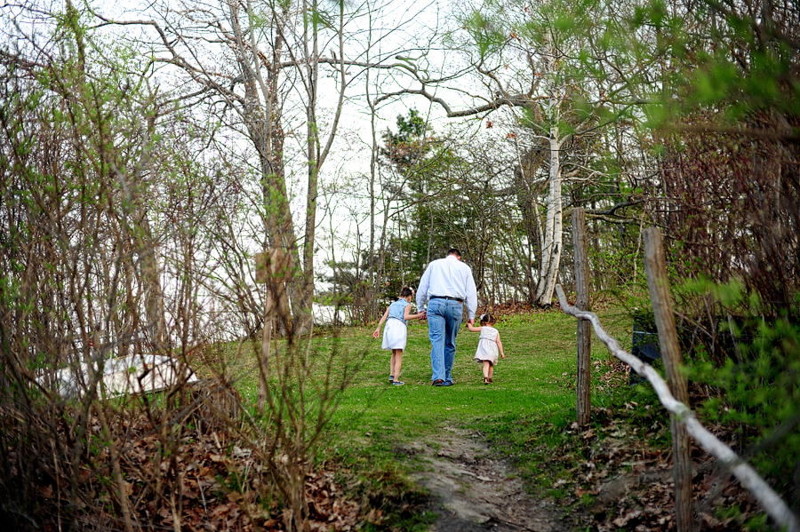 father walking with daughters