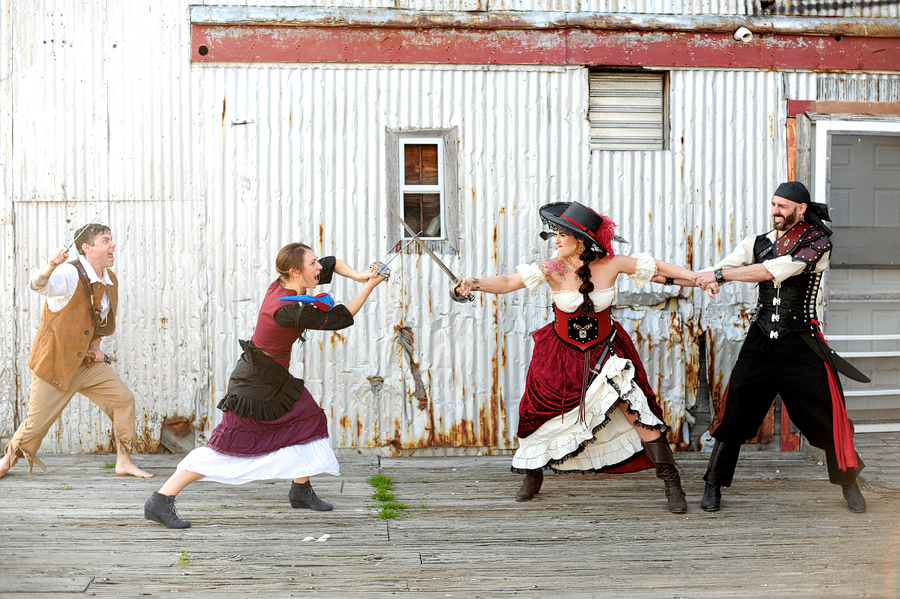 pirate women having a sword fight