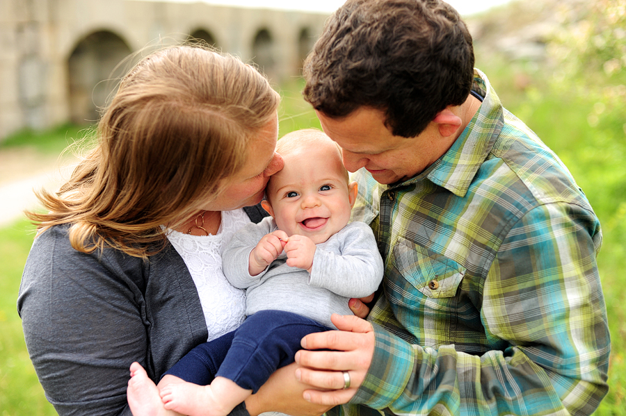 parents with their happy baby