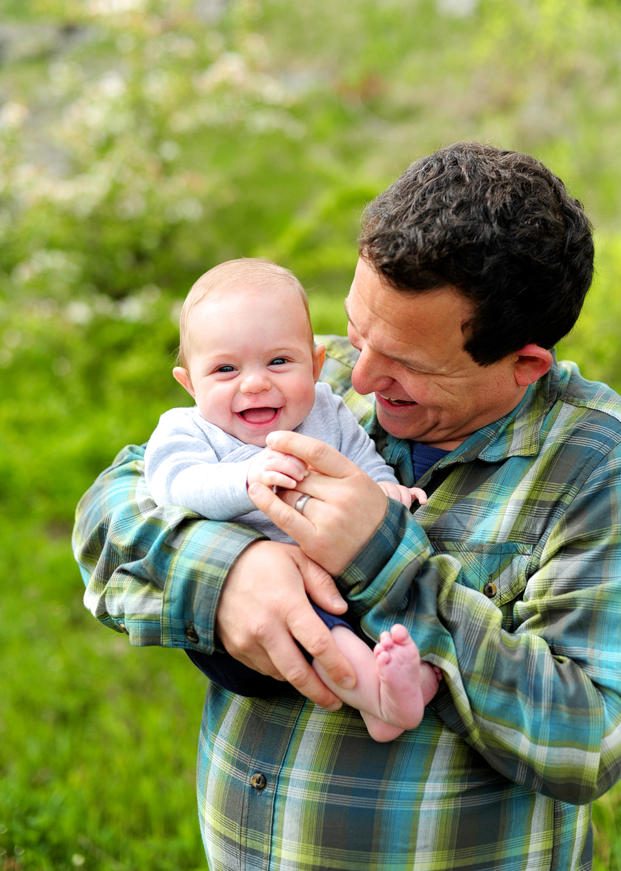 father smiling with his son