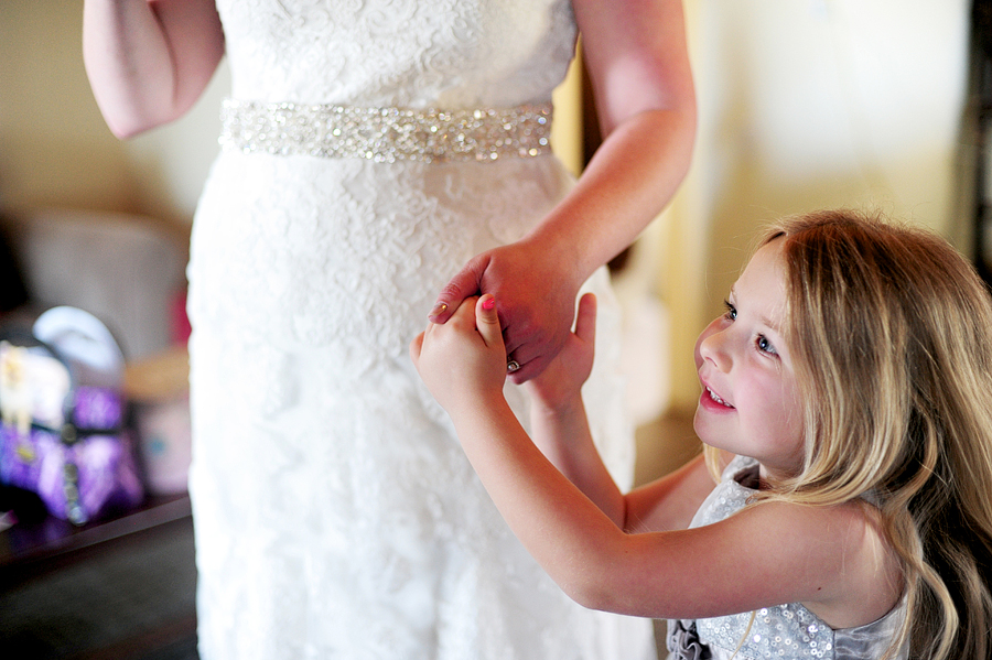 flower girl holding the bride's hand