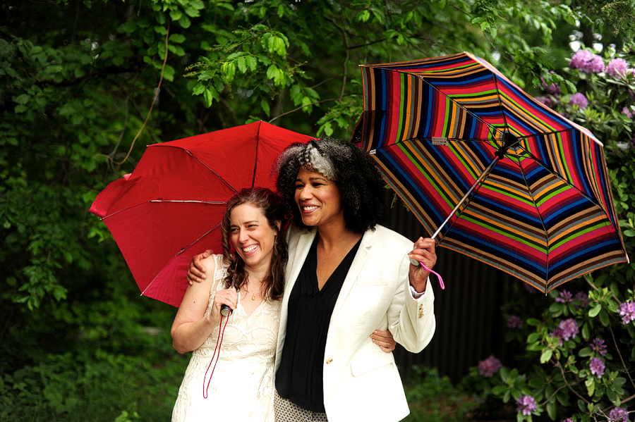 a rainy day wedding first look