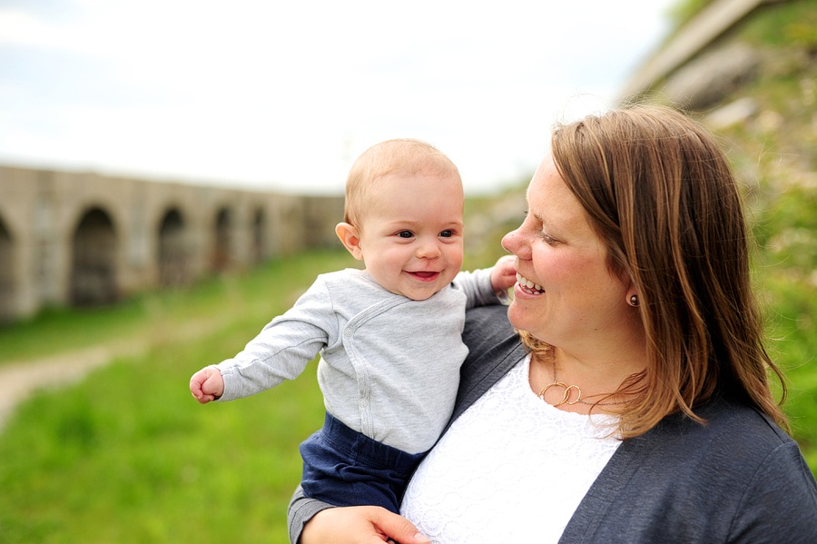 mom laughing with her baby son