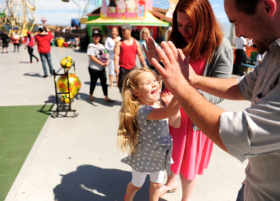 dad high fiving his daughter