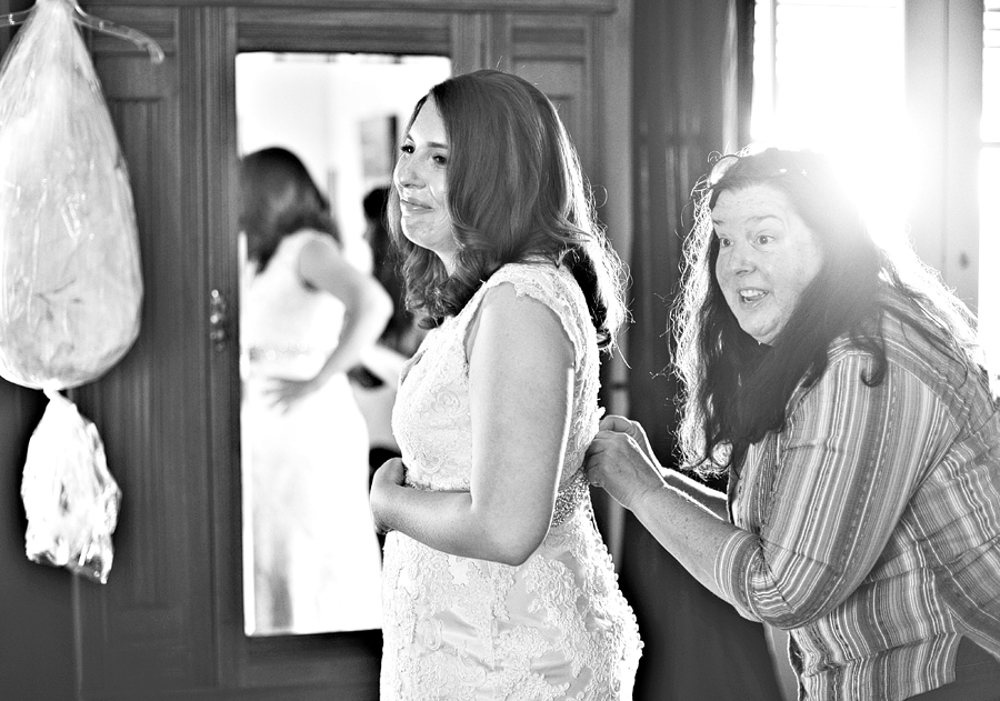 a bride getting ready with her mother