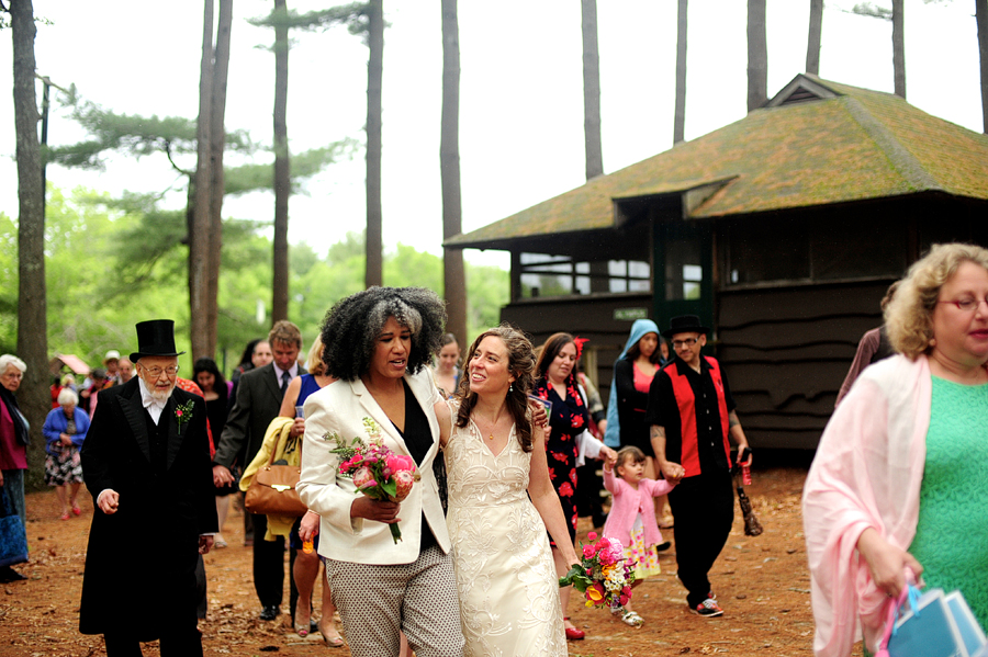 brides walking with their guests at camp wing