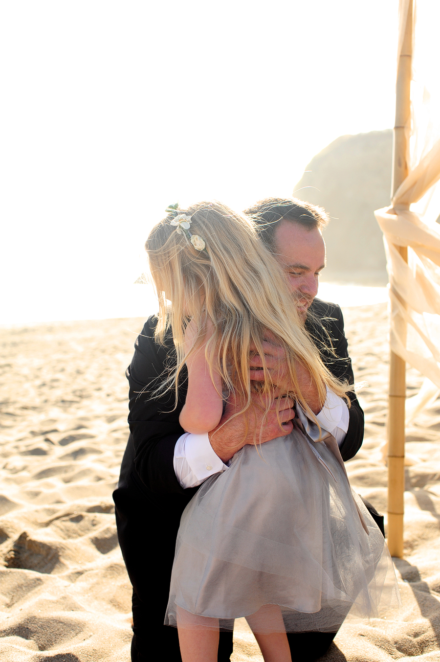 groom hugging his step-daughter