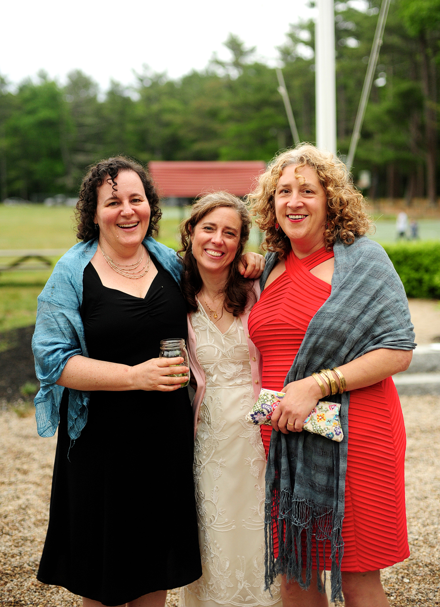 bride posing with her friends