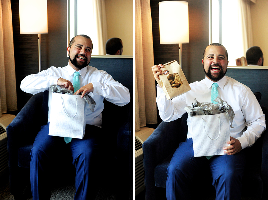 groom opening a gift from his bride