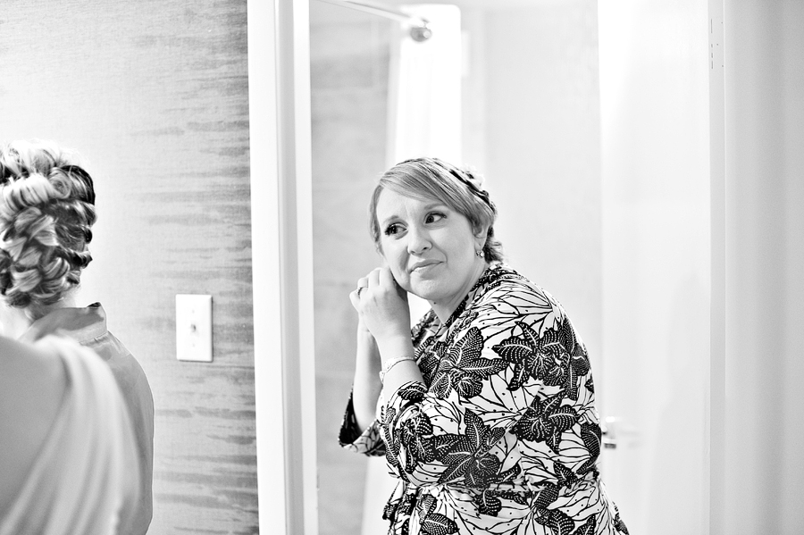 bride getting ready in a floral robe