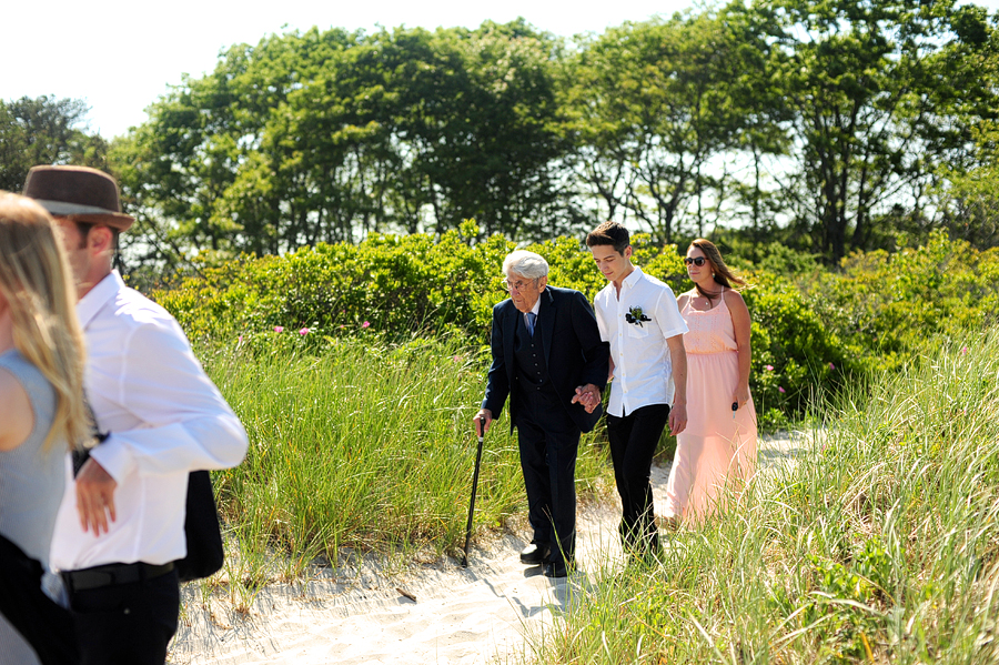 wedding guests walking to crescent beach in cape elizabeth