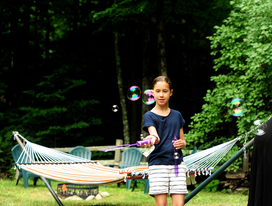 blowing bubbles at a family session