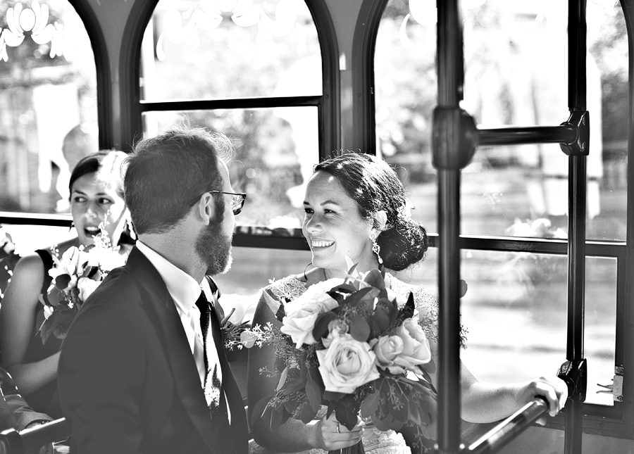 wedding couple riding in a trolley around portland, maine