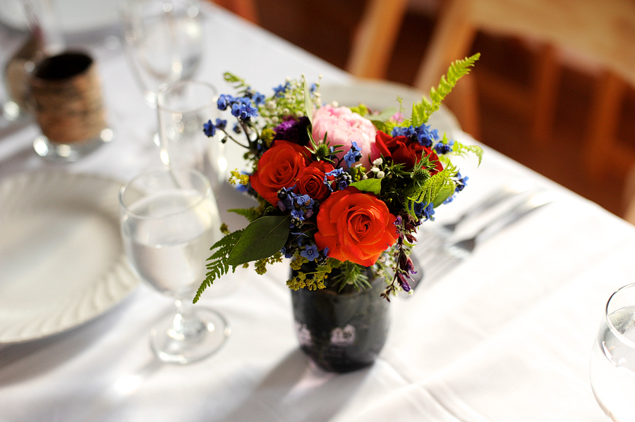 floral centerpiece at mayo street arts wedding