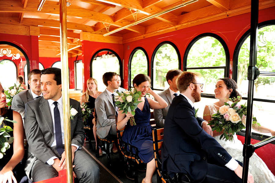 wedding party traveling on a trolley in portland, maine