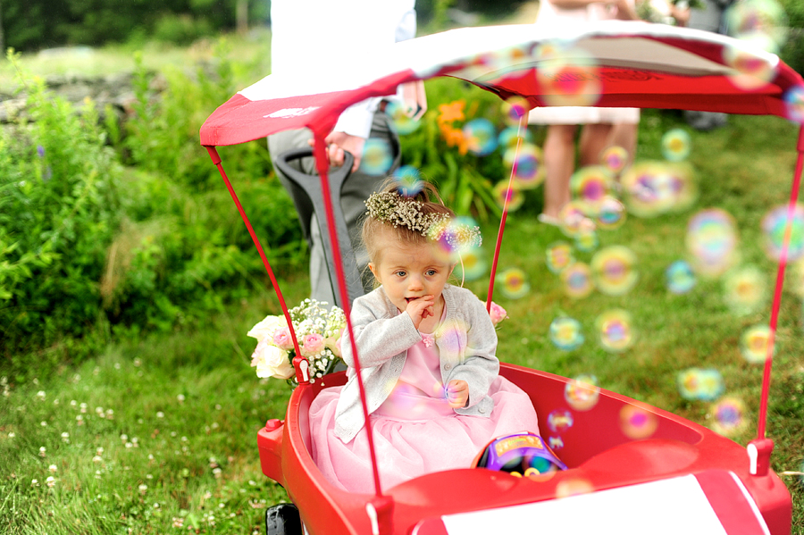 flower girl in toy car