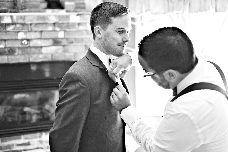 groom getting ready at christmas farm inn