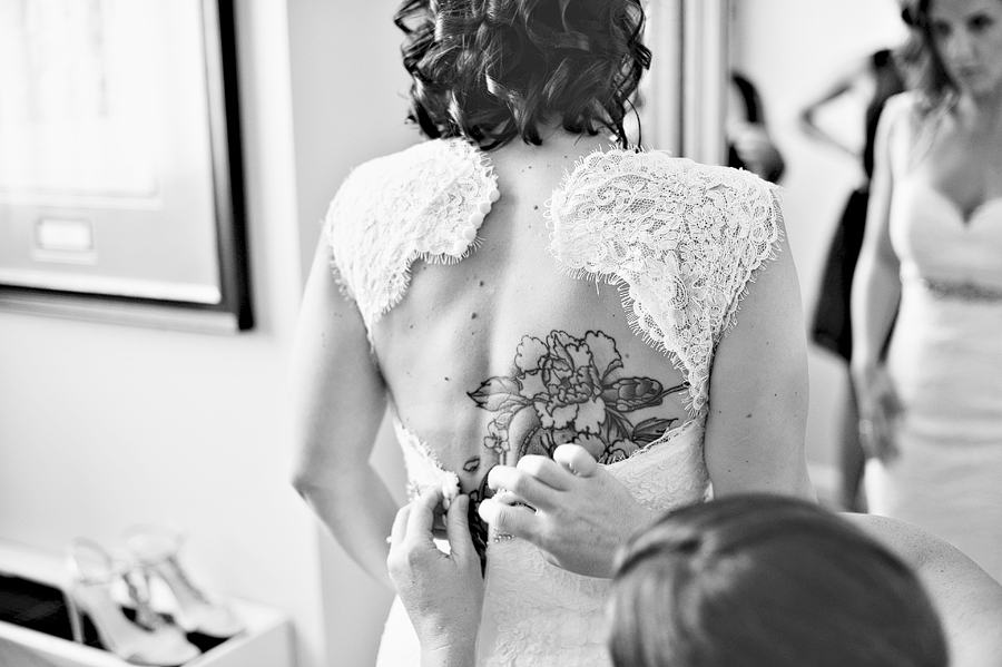 bride with a back tattoo