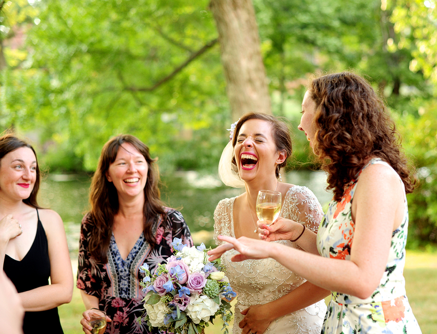 bride laughing with friends