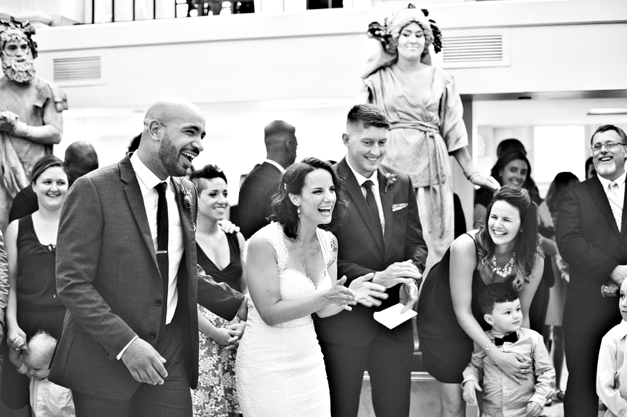 couple laughing at wedding toast