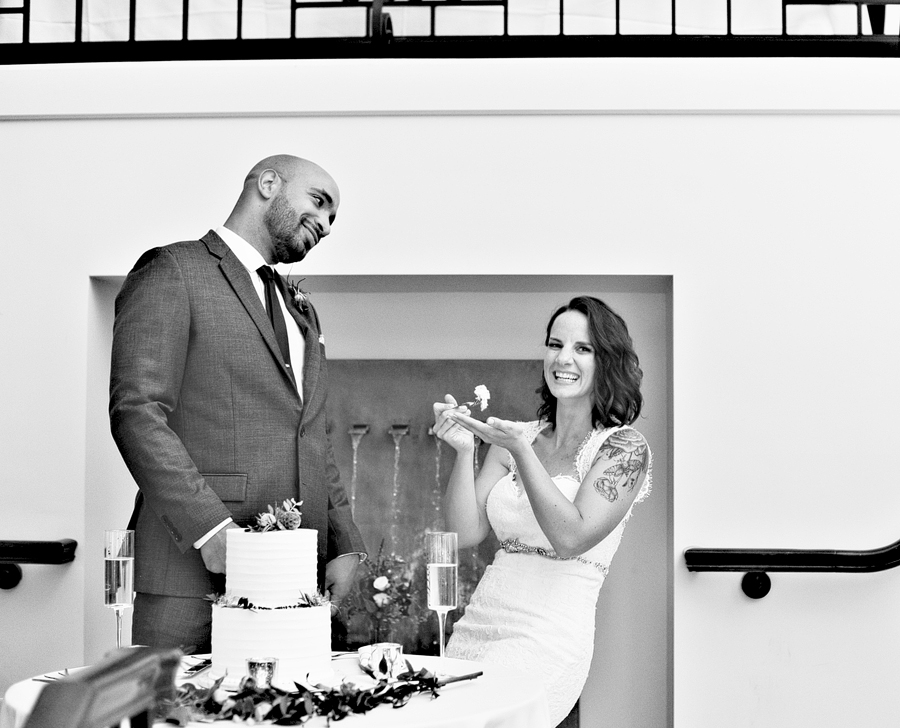 bride and groom cutting cake