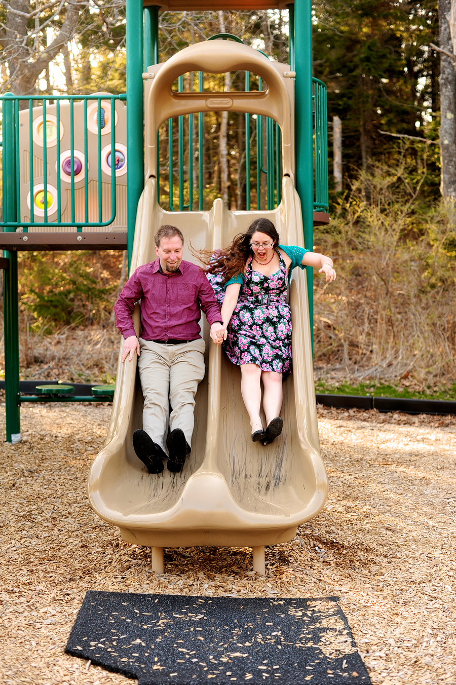 engagement photos at a playground