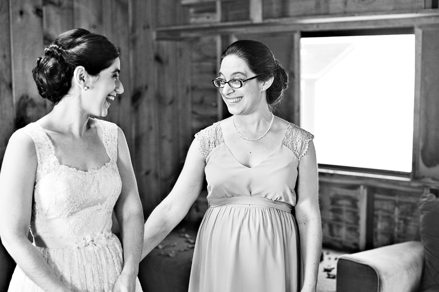 bride getting ready with sister
